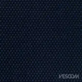 Vescom Rolla Blu Notte textile, midnight blue fabric with repeating raised circular dot pattern and subtle sheen.